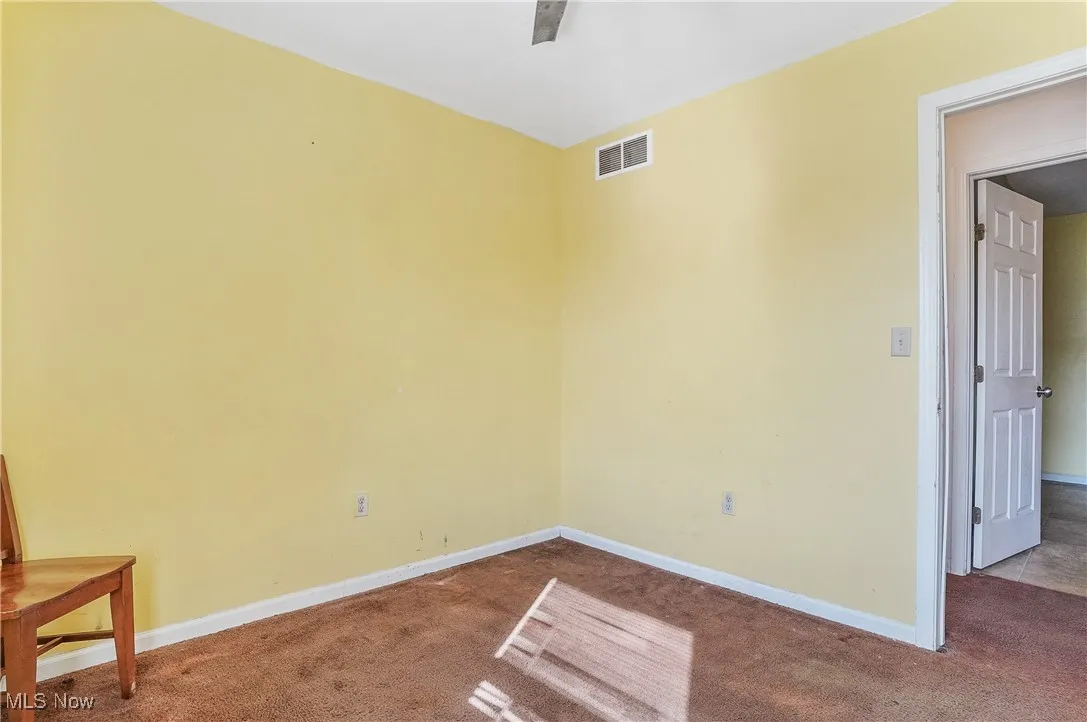 Spare room with carpet flooring