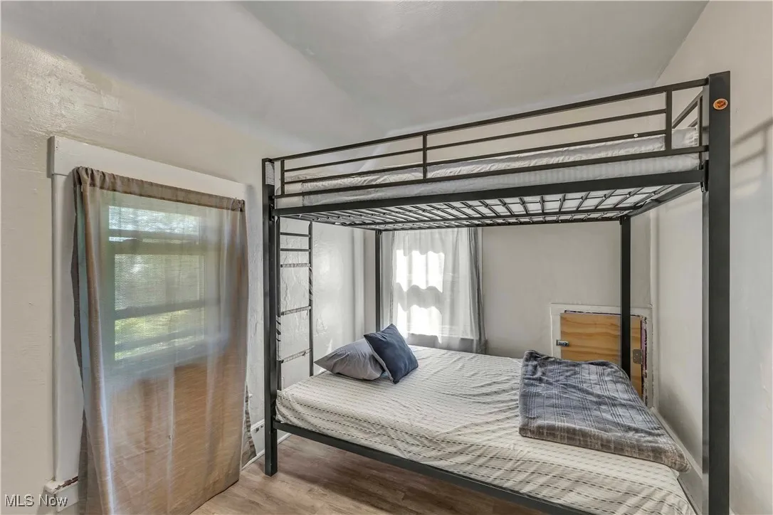 Bedroom featuring wood finished floors