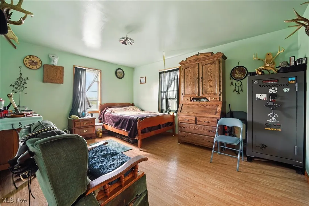 Bedroom with light wood finished floors