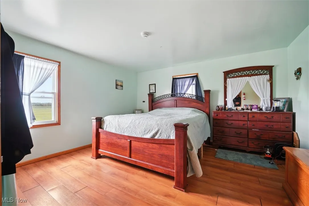 1st floor Bedroom with light wood-type flooring