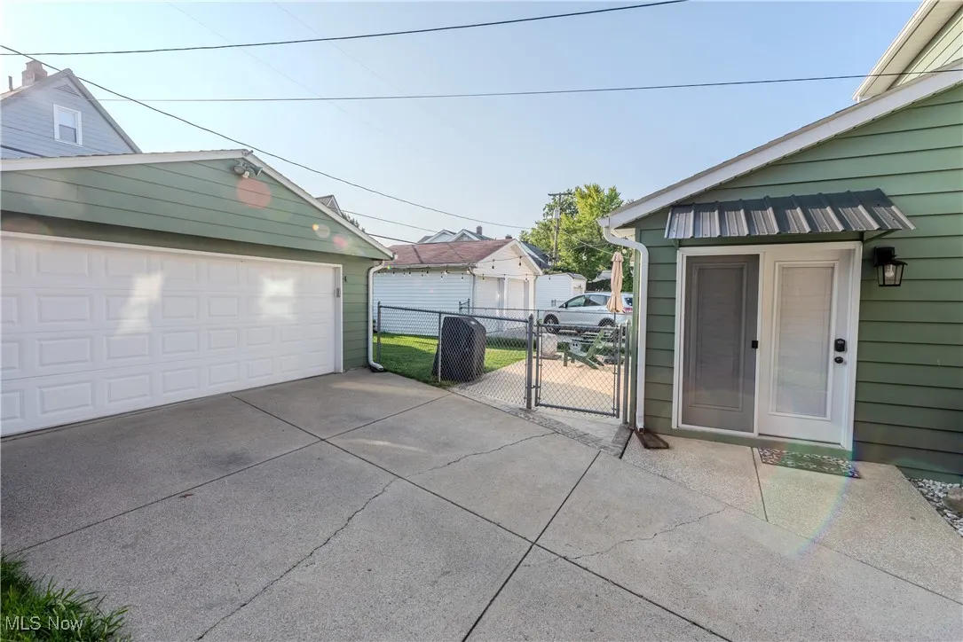 2 car Garage and side entry to the 4 seasons room