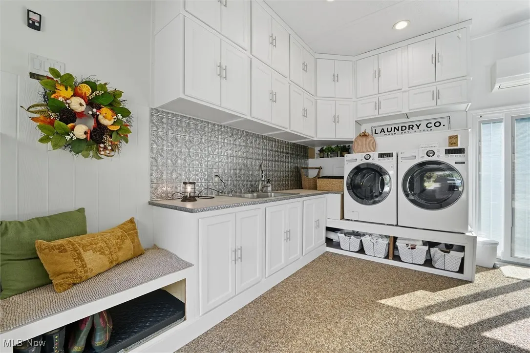 Located in the finished garage, complete with a sliding door to the backyard, nature stone floor, mini-split for heating and cooling