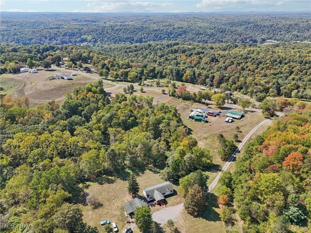 Drone / aerial view of a heavily wooded area