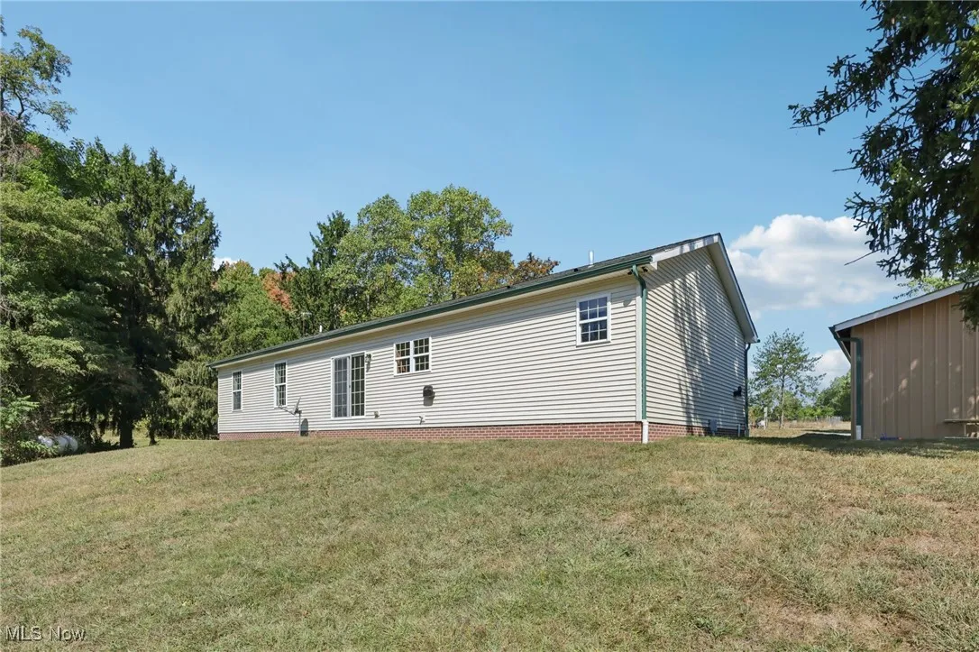 View of front of house with a front lawn