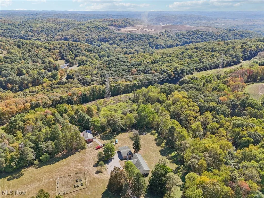 Drone / aerial view of a heavily wooded area