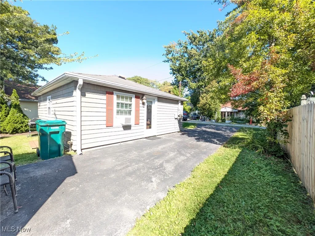 Reverse view towards street and showing back of home