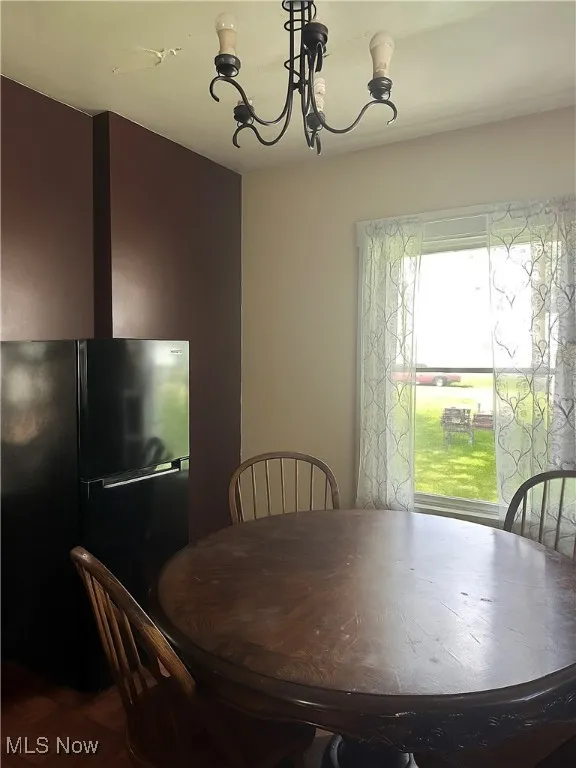 Dining area with a chandelier