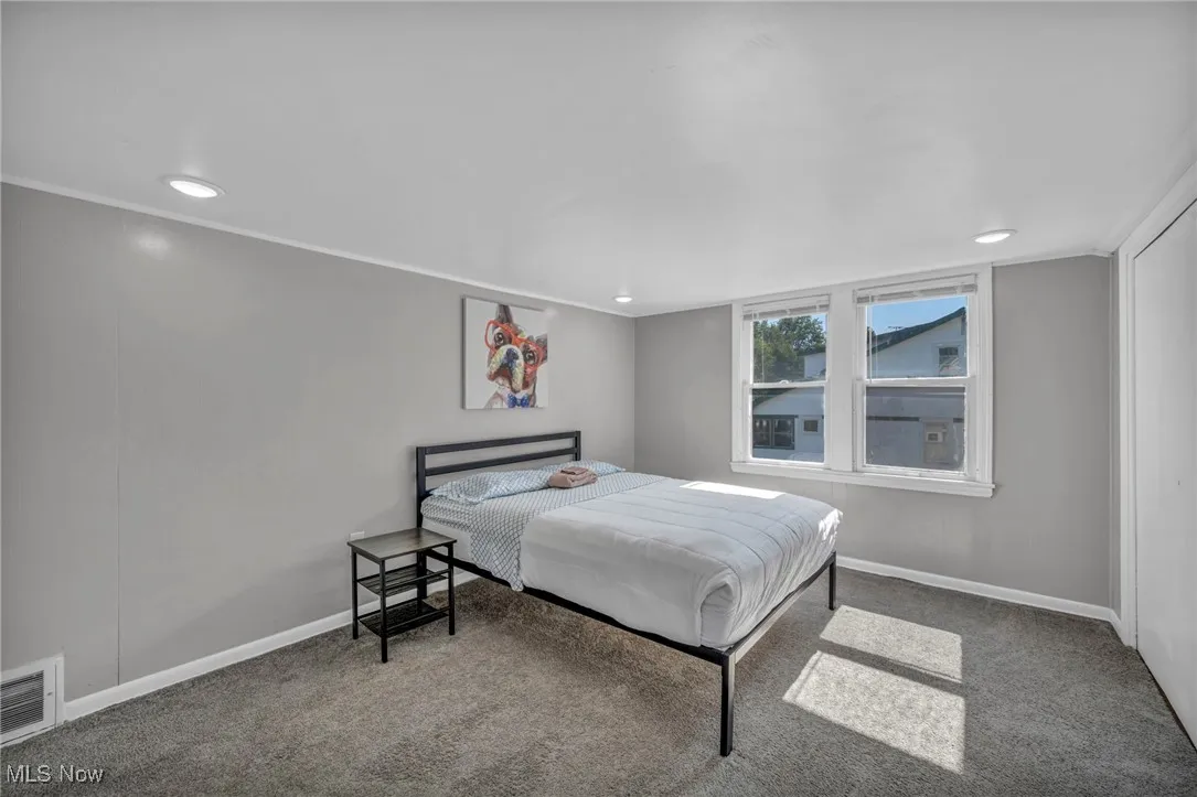 Bedroom featuring carpet floors and recessed lighting