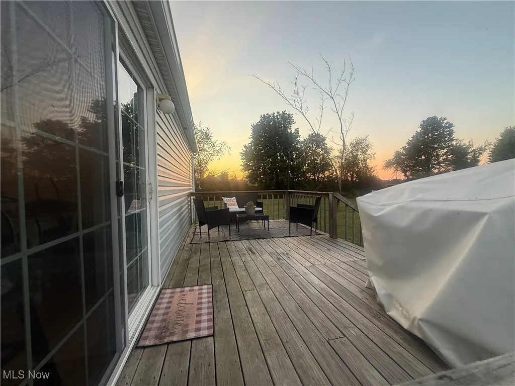 View of deck at dusk