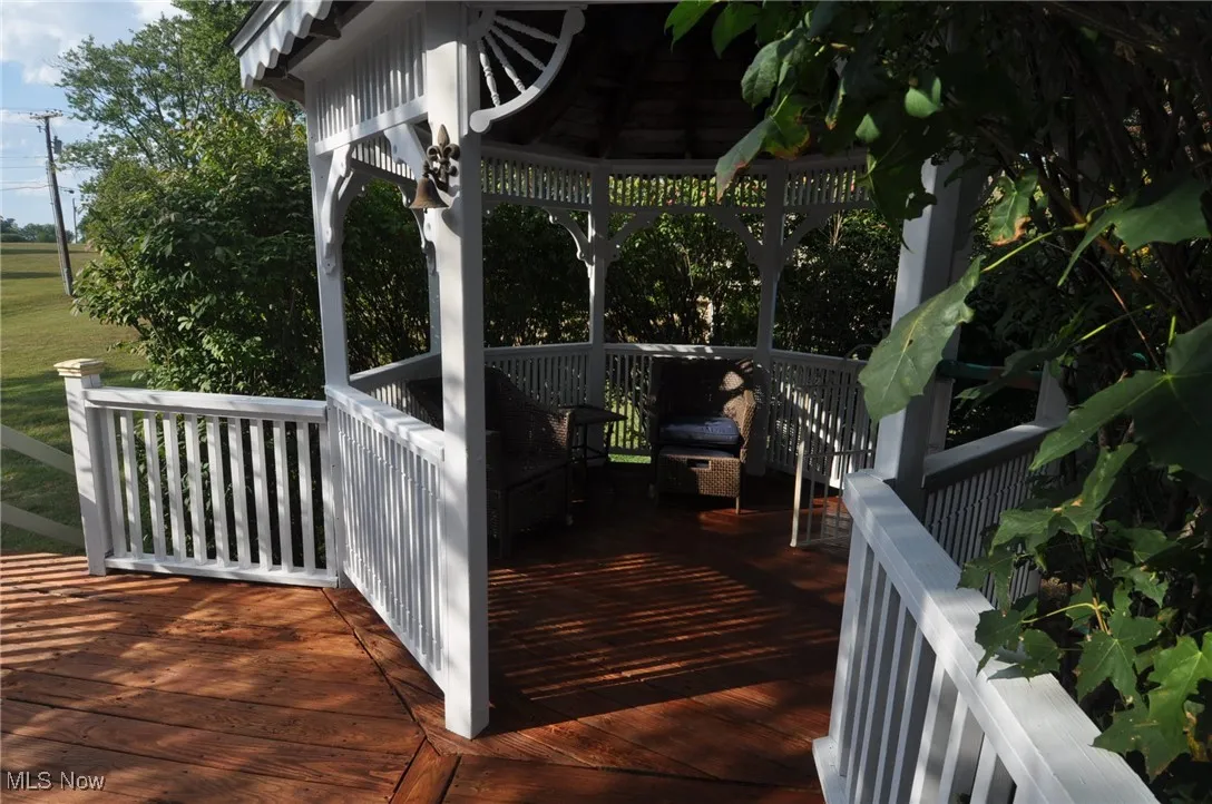 Side deck featuring a gazebo