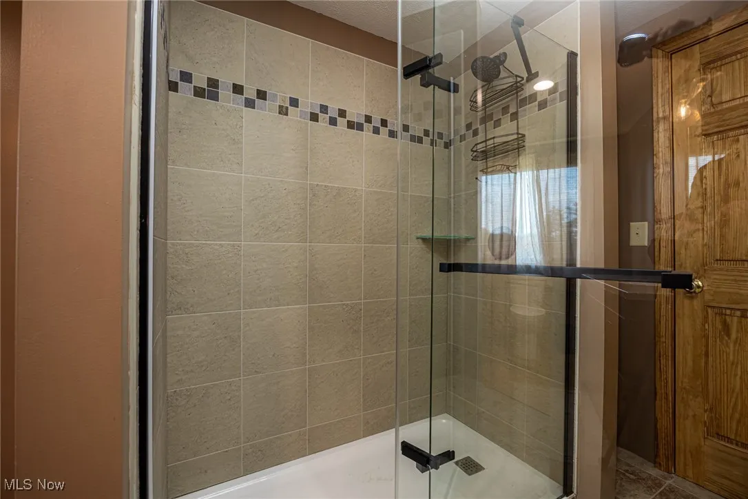 Bathroom with a shower stall
