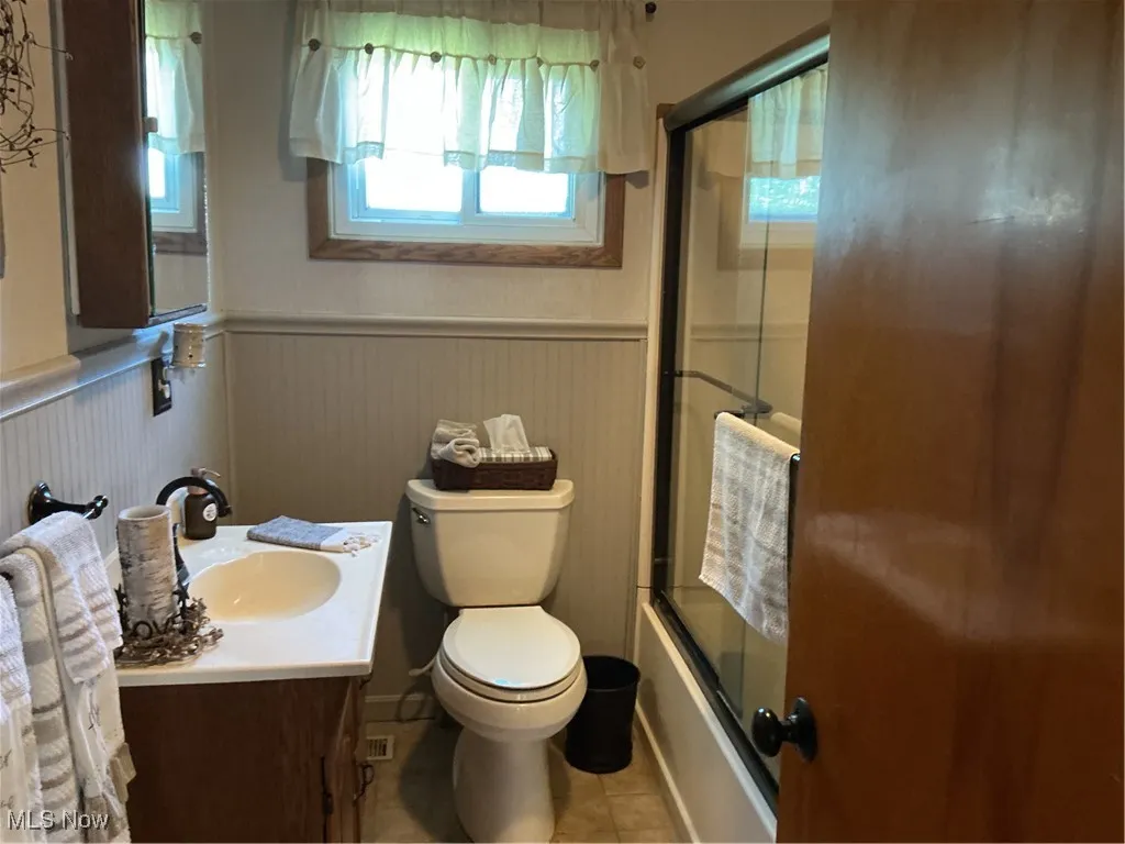 With shower and soaker tub
