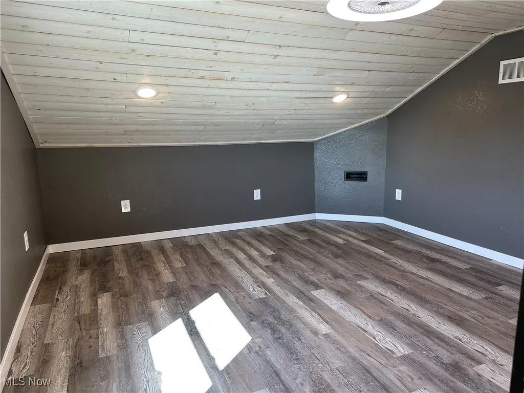 Bedroom 2 with wood ceiling, vaulted ceiling, recessed lighting, and dark wood-style flooring