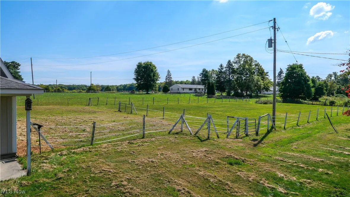 View of yard with a view of countryside