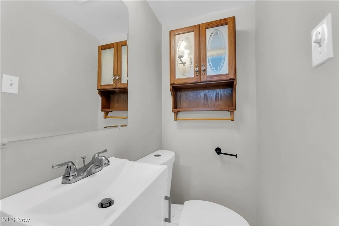 Bathroom featuring a sink and toilet
