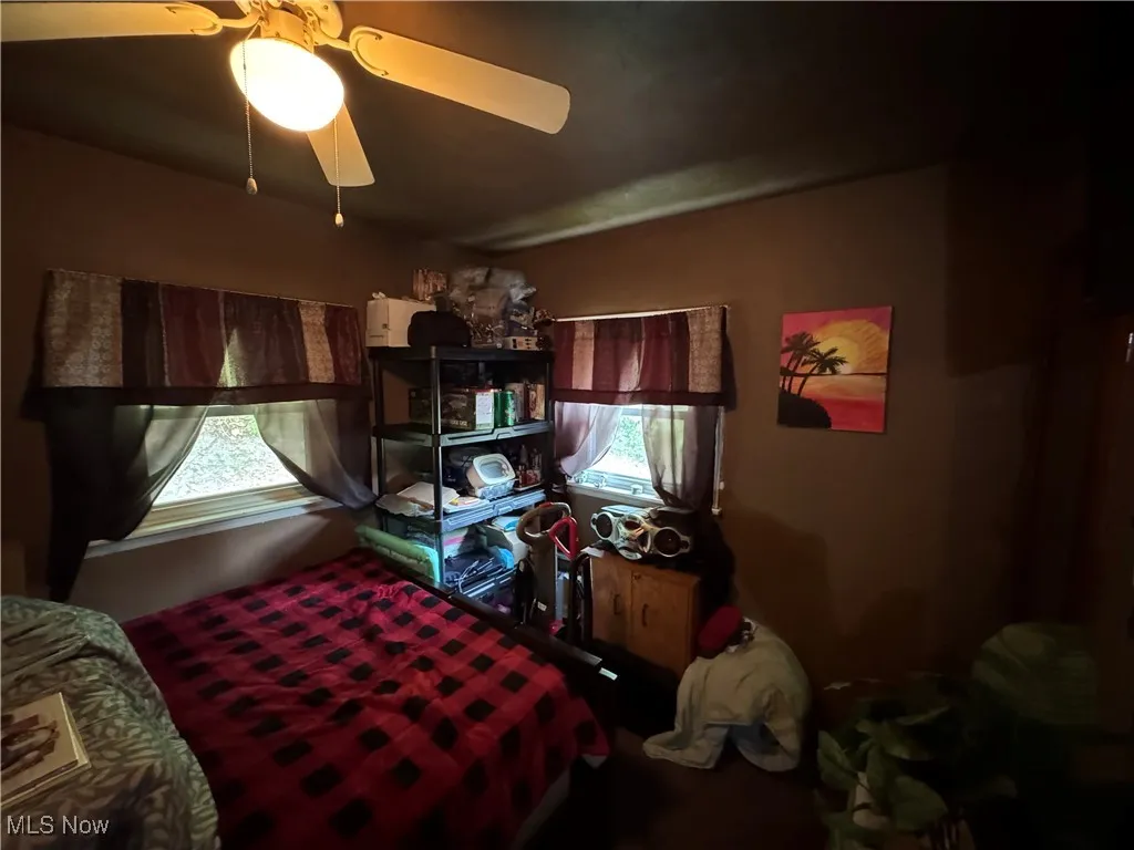 Bedroom with a ceiling fan