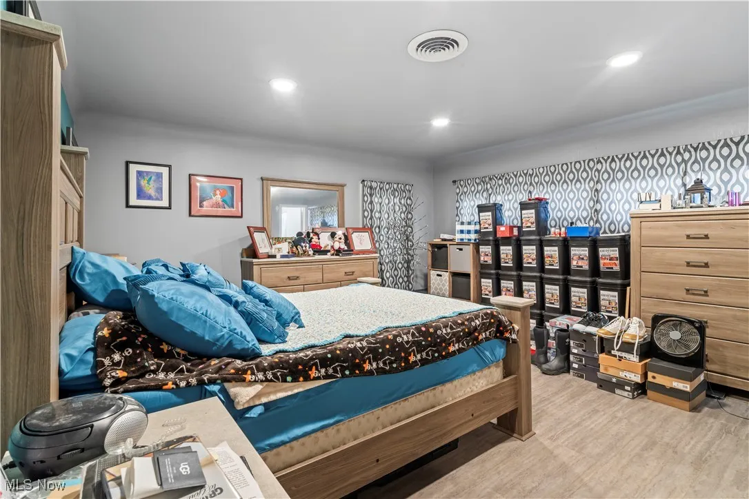Bedroom with recessed lighting