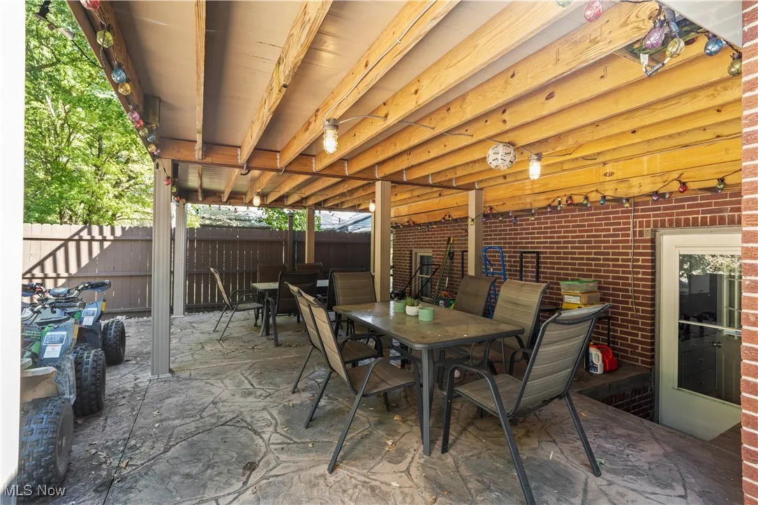 View of patio with outdoor dining space