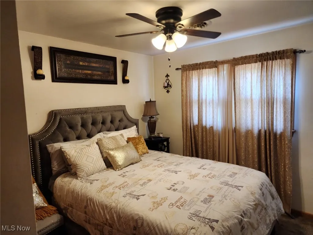Bedroom with a ceiling fan