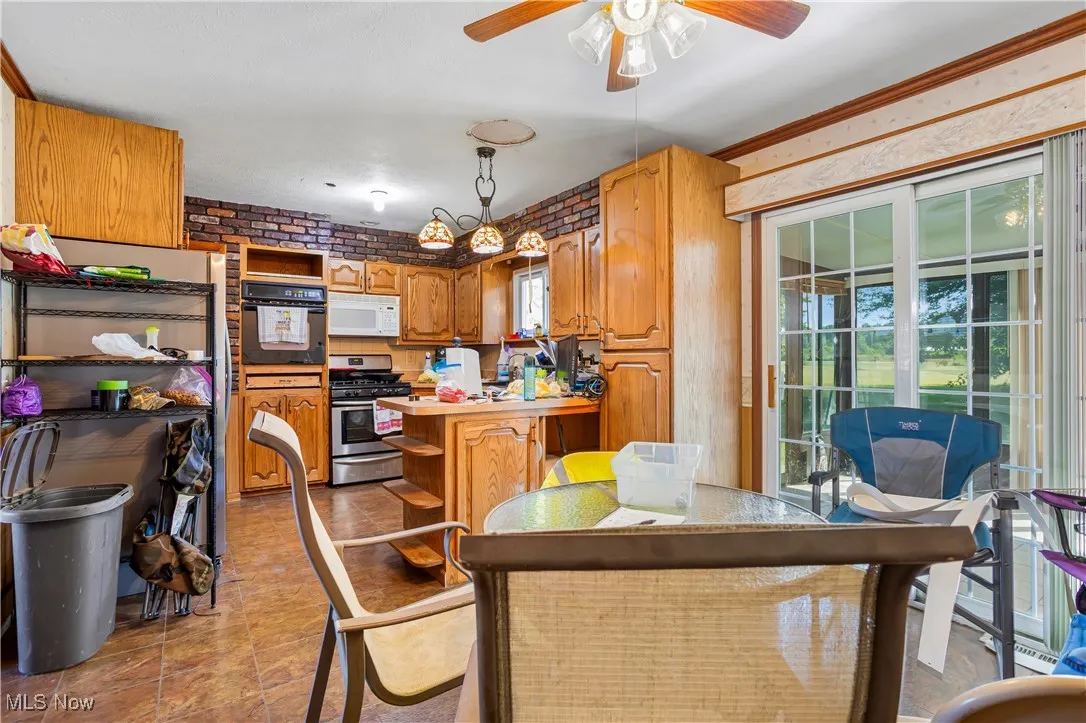 Dining room with a ceiling fan