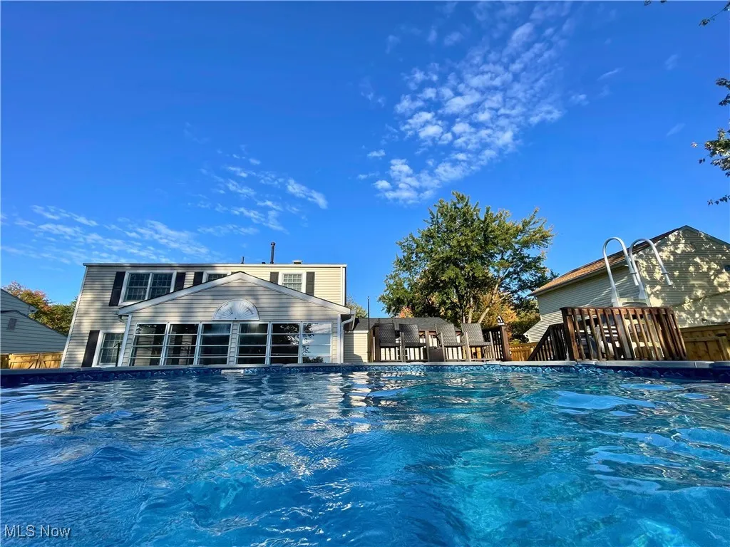 Outdoor pool with a patio