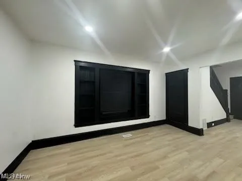 Spare room with light wood-style floors