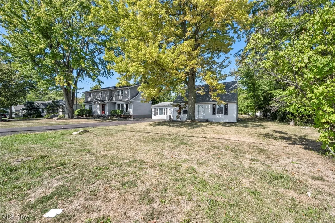 View of front of property with a front lawn