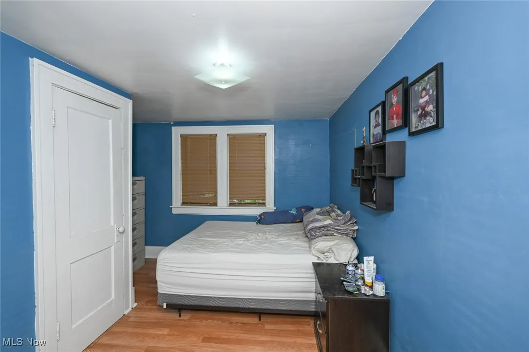 Bedroom with light wood-style flooring
