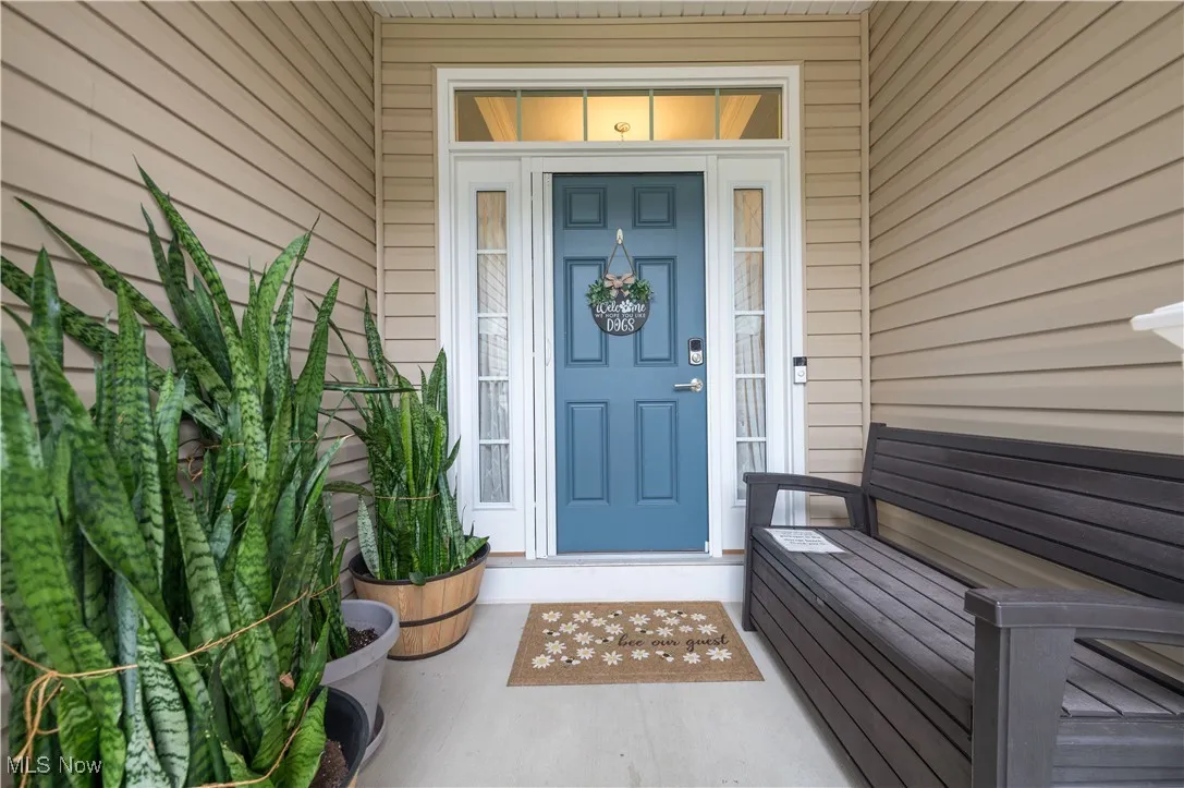 Property entrance with a porch