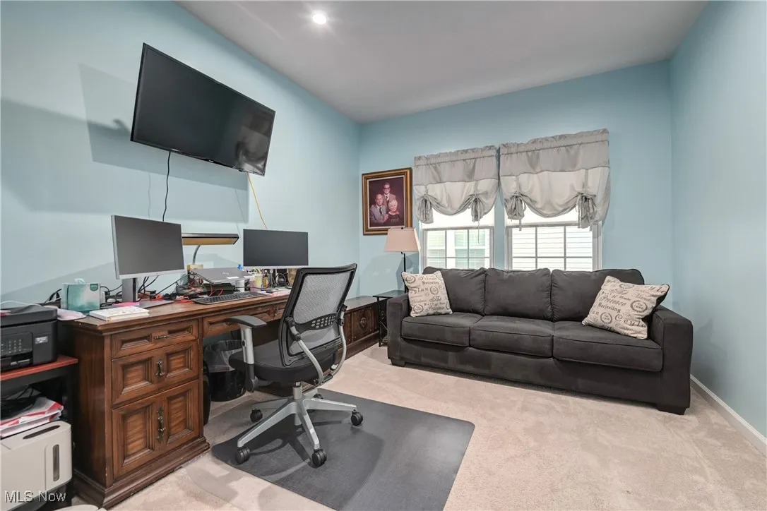 Office with light colored carpet