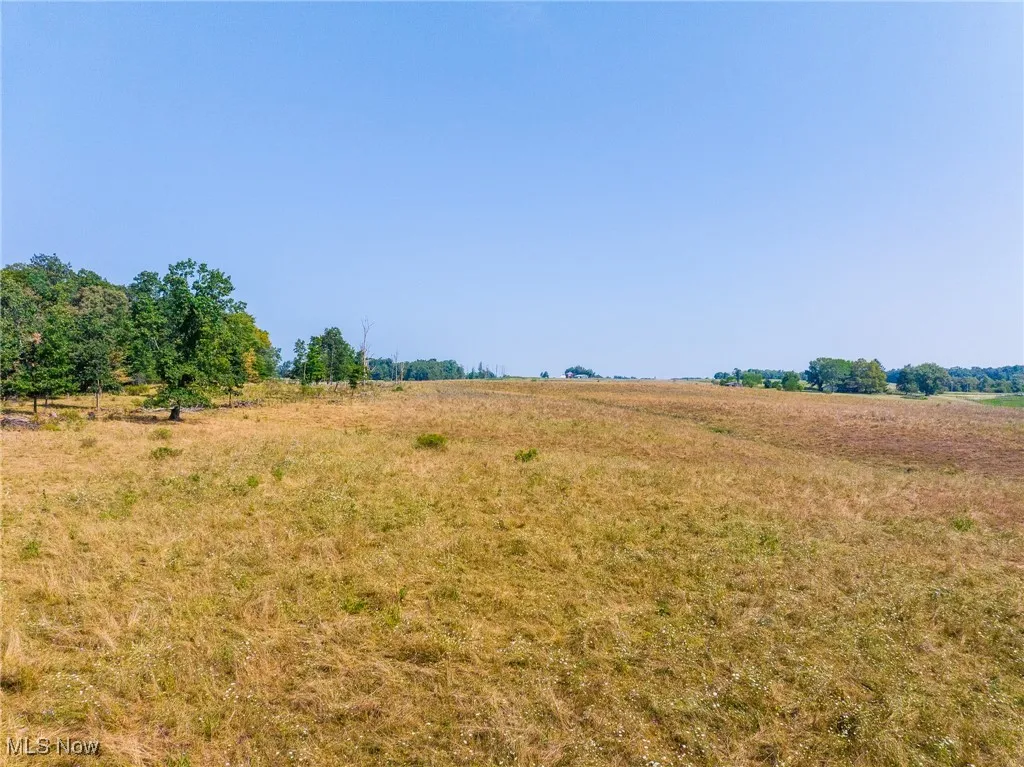 View of yard with a view of countryside