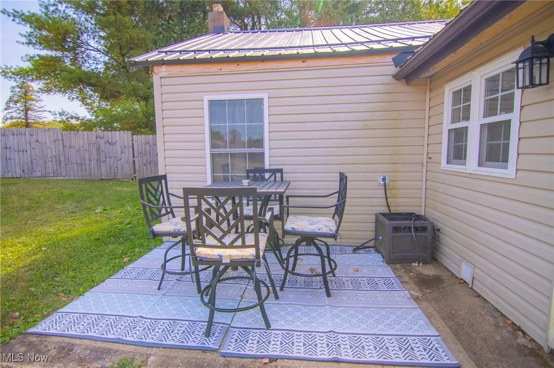 View of patio featuring outdoor dining area
