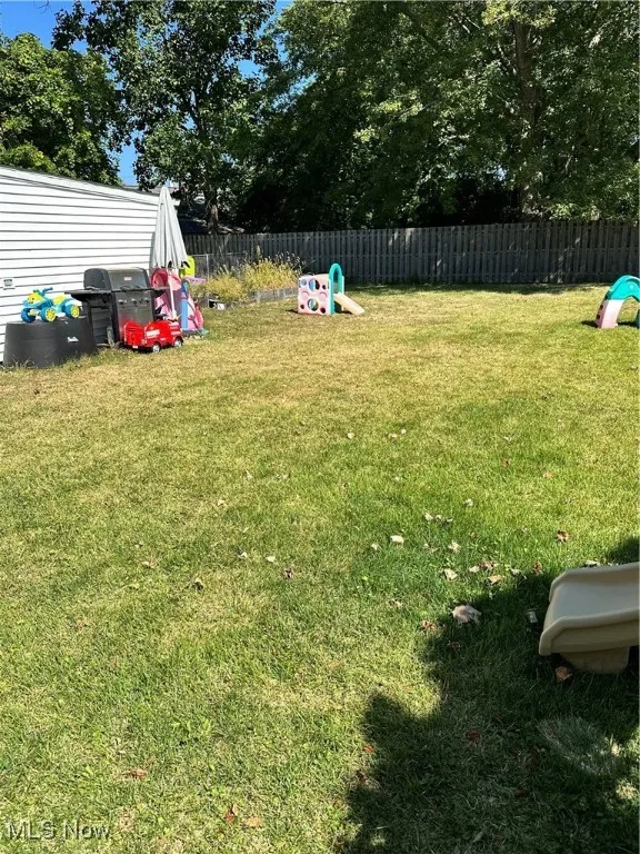 View of fenced backyard