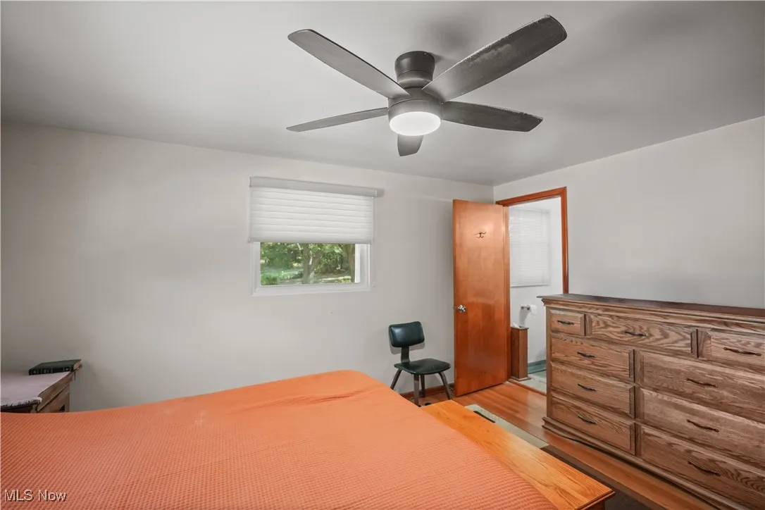 Bedroom featuring light wood-style floors and ceiling fan