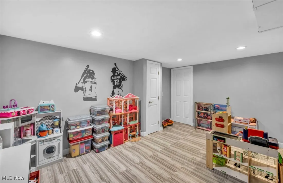 Playroom featuring recessed lighting and light wood-type flooring