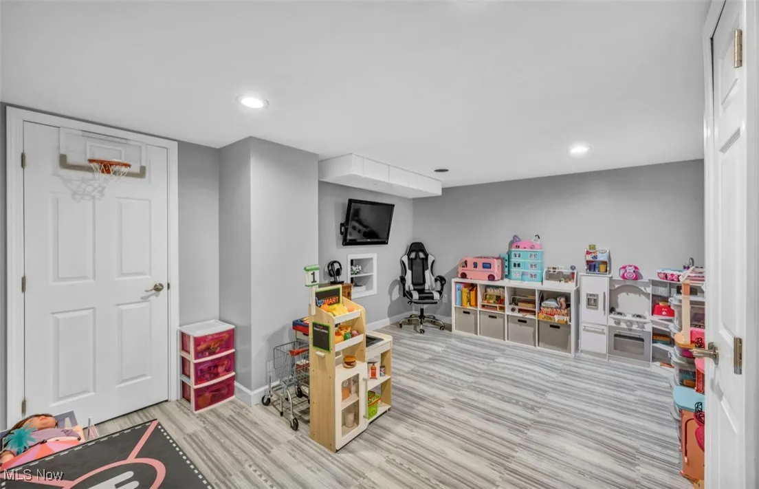 Recreation room featuring recessed lighting and light wood finished floors