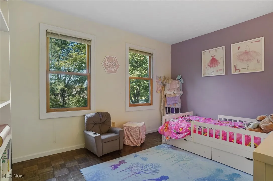 Bedroom featuring baseboards