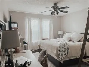 Bedroom with a ceiling fan