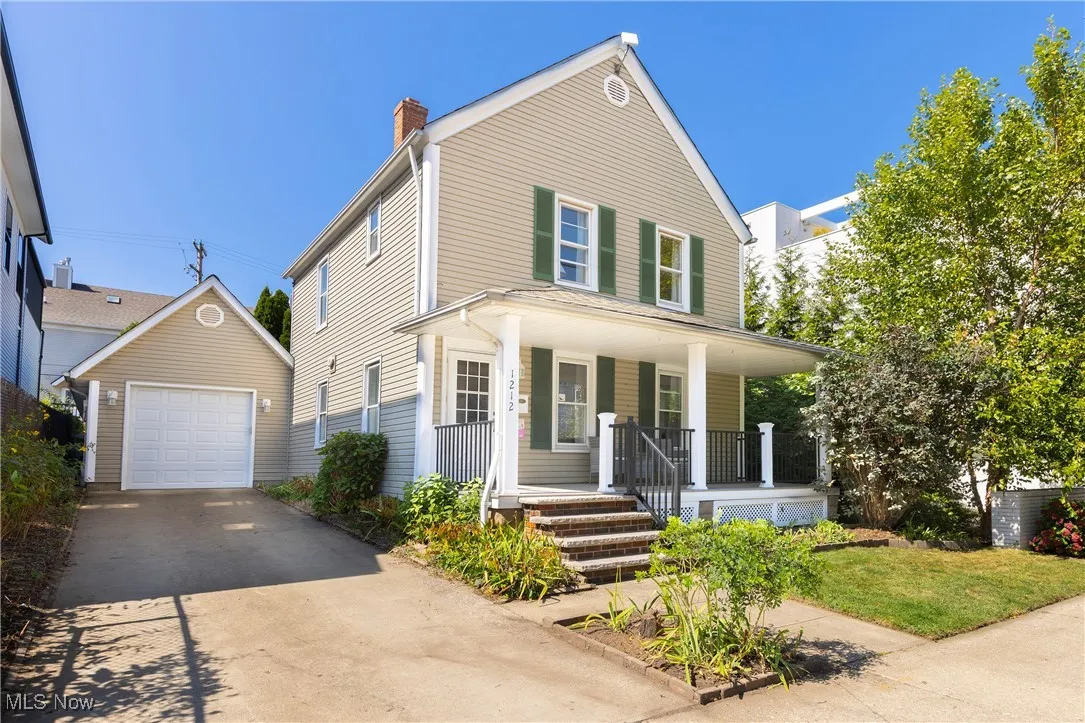 Front of the home with attached tandem TWO CAR garage