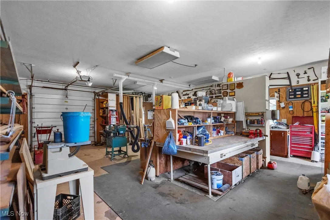 Garage featuring a workshop area
