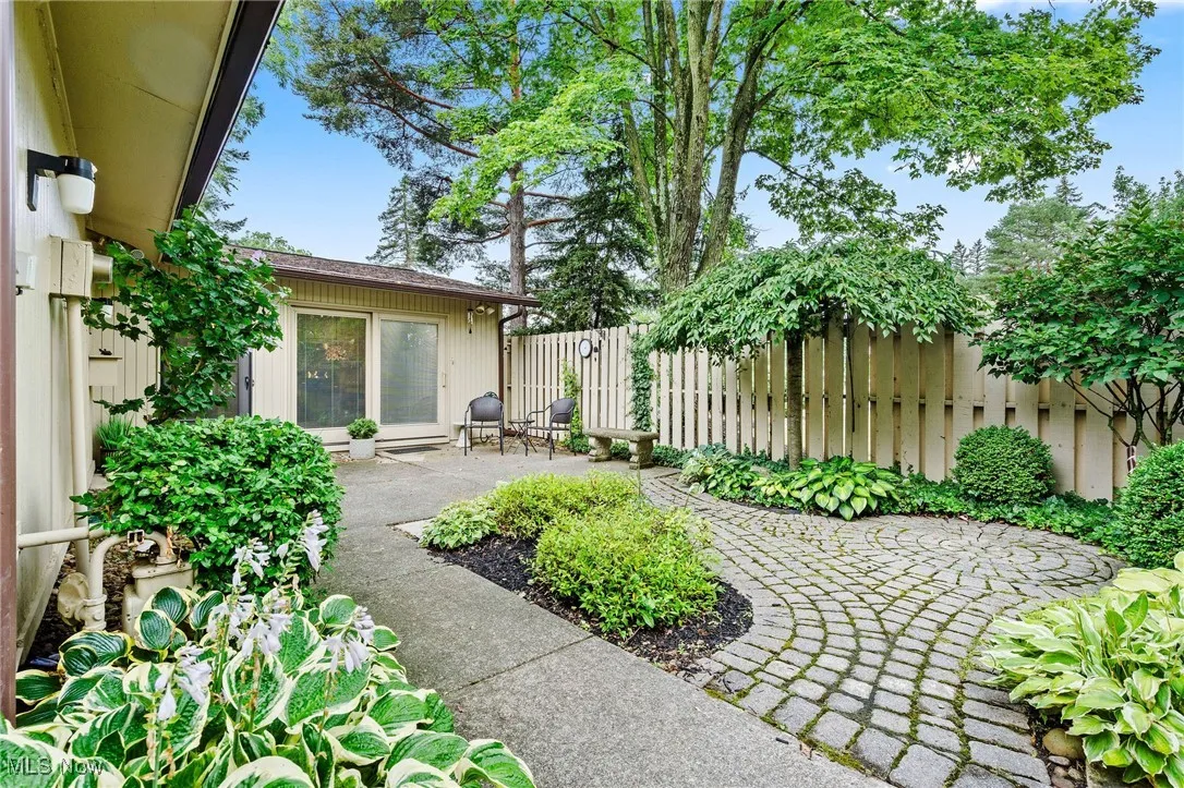 Fenced backyard with a patio area