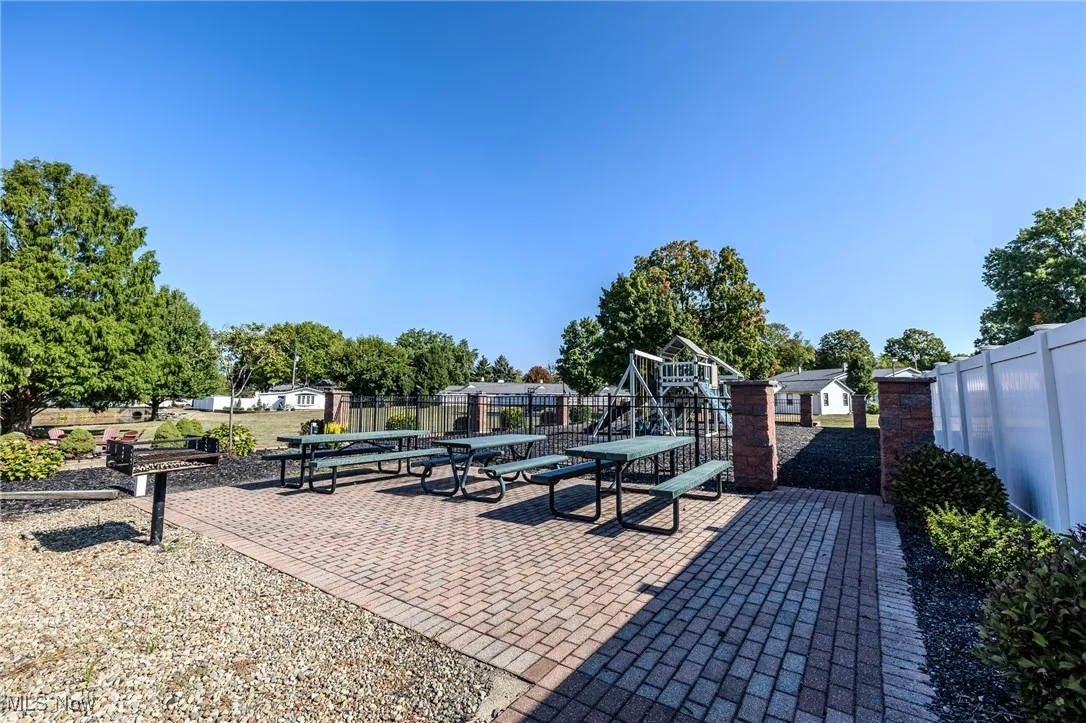 View of patio featuring outdoor dining area