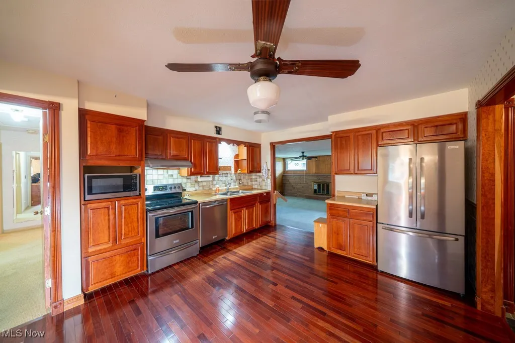 Cherry Wood Floor and Cherry Cabinent Doors.