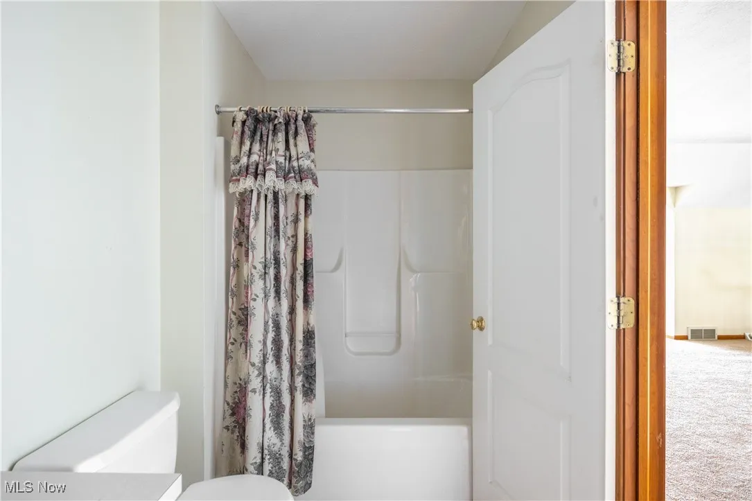 Bathroom featuring shower / bath combination