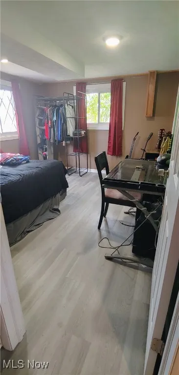 Bedroom with light wood finished floors