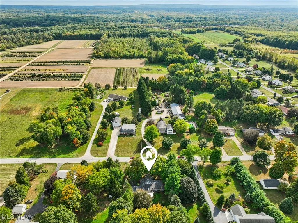Aerial view of sparsely populated area featuring abundant farmland