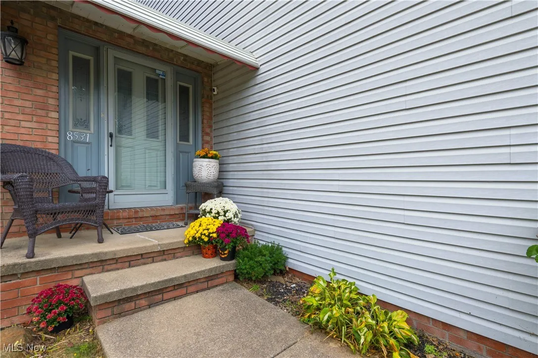 Entrance to property with covered porch