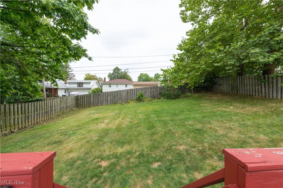 View of fenced backyard
