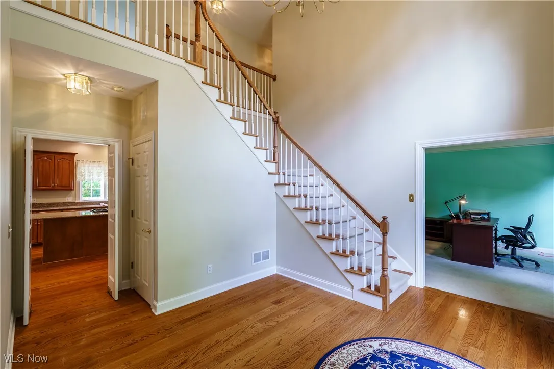 Large entry way to Living Room/Office. Doors open from Foyer into Kitchen.