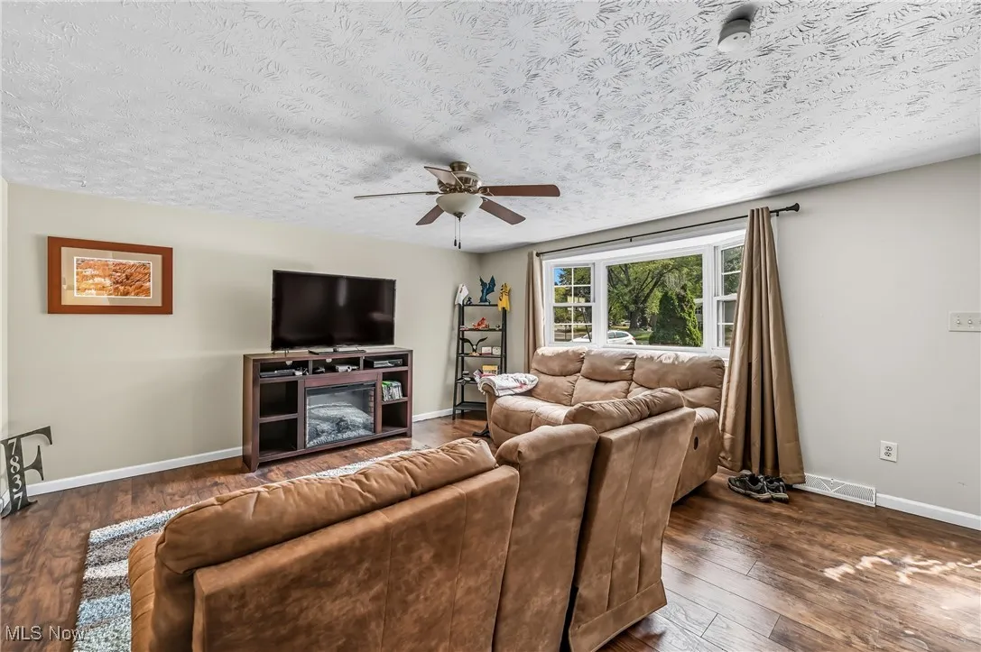 Relax and unwind after a long day in the cozy living room